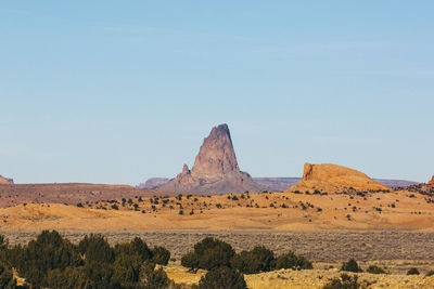 Scenic view of rock formation against clear sky