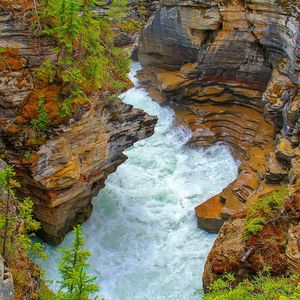 View of rock formations in water
