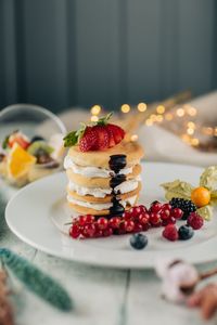 Close-up of strawberries in plate on table