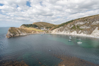 Landscape photo of lulworth cove in dorset.