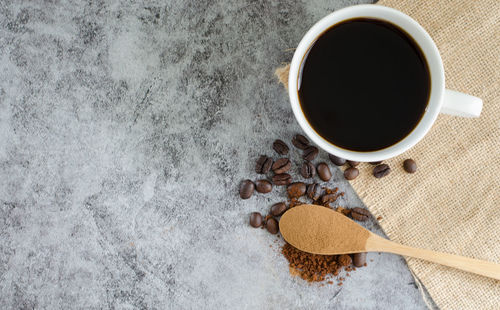 High angle view of coffee cup on table