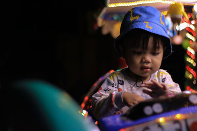 Portrait of young boy playing fun on the playground