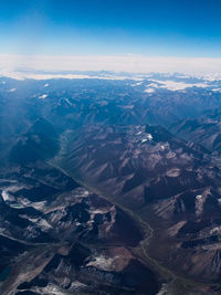 Aerial view of dramatic landscape against sky