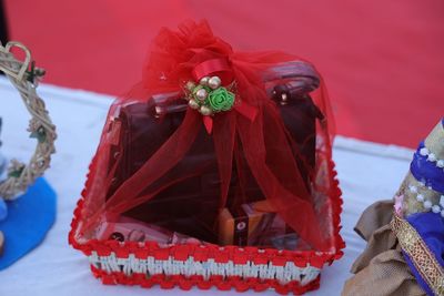 Close-up of red roses on table