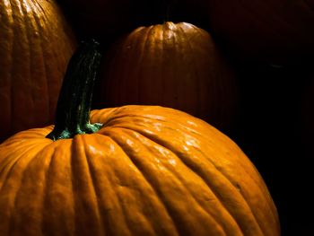 Close-up of pumpkin against black background 