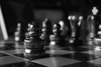 Close-up of chess pieces on board