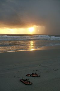 Scenic view of sea at sunset