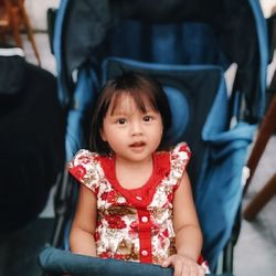 Portrait of a smiling girl sitting