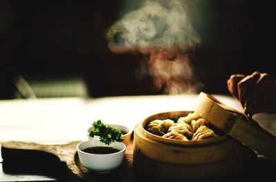 Close-up of dumplings in container on table