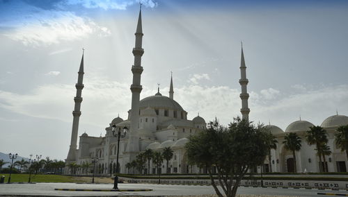 View of buildings in city against sky