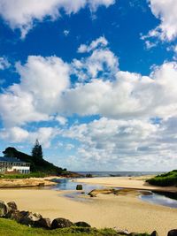 Scenic view of beach against sky