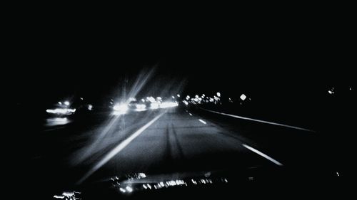 Light trails on road at night