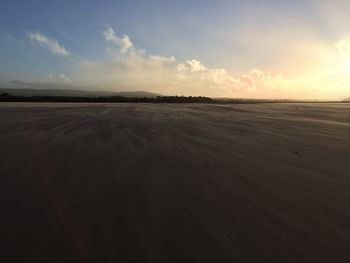 Scenic view of sea against sky at sunset