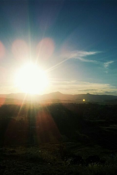 sun, sunbeam, lens flare, sunlight, tranquil scene, tranquility, scenics, sky, beauty in nature, sunset, bright, mountain, landscape, nature, idyllic, sunny, cloud - sky, silhouette, outdoors, non-urban scene