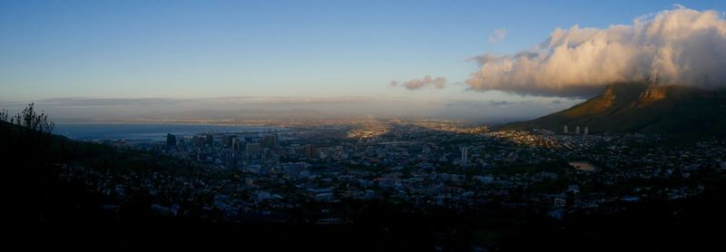 High angle view of buildings against sky during sunset