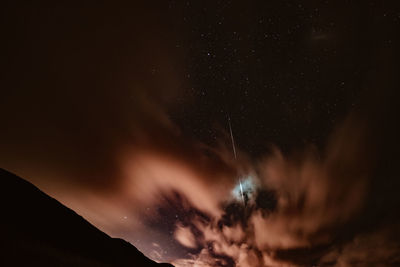 Low angle view of stars against sky at night