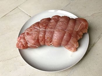 High angle view of meat in plate on table