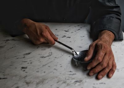 High angle view of man working on table