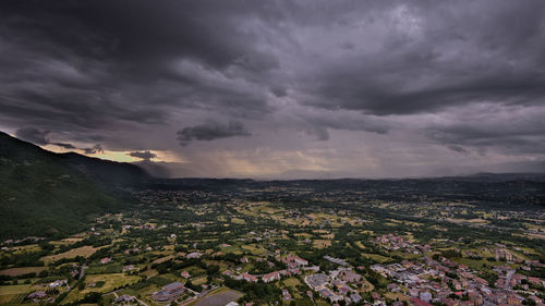 Aerial view of city against sky