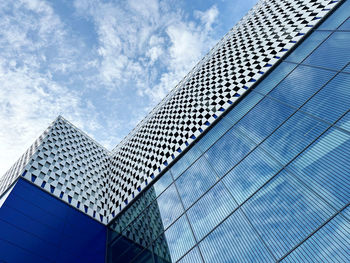 Low angle view of modern building against sky