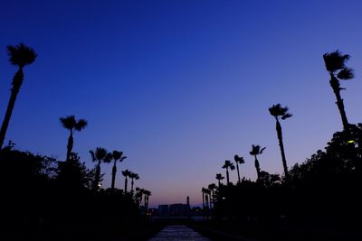 Road against clear sky at dusk