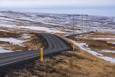 Empty road against sky