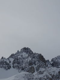 Scenic view of snow covered mountain against sky