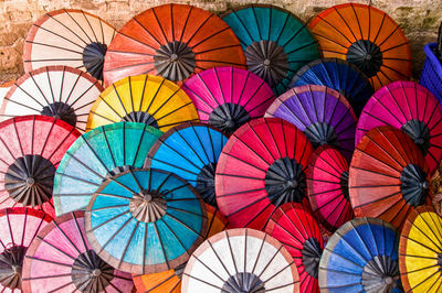Full frame shot of multi colored umbrellas at market
