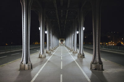 France, ile-de-france, paris, underside of pont de bir-hakeim at night