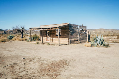 Abandoned built structure against clear sky