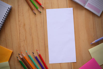 High angle view of colored pencils on table