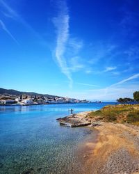 Scenic view of sea against blue sky