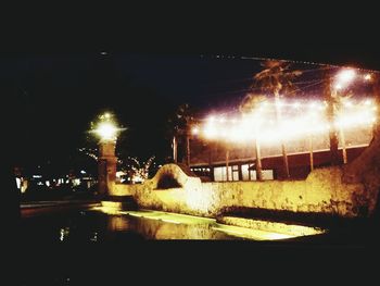 Illuminated street lights at night