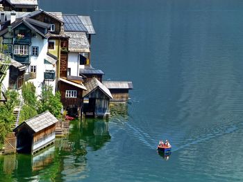 Boat in water against sky