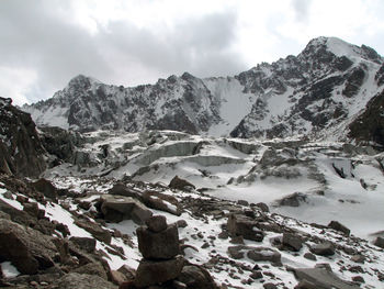 Scenic view of mountains against sky during winter