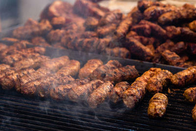 Close-up of meat on barbecue grill