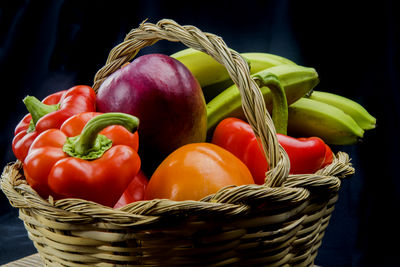 High angle view of tomatoes in wicker basket