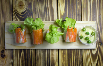 High angle view of vegetables in plate on table