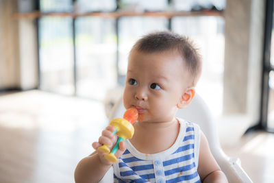 Portrait of cute boy eating ice cream