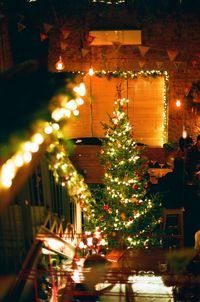 Illuminated christmas tree at night