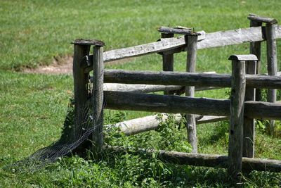 Wooden fence on field