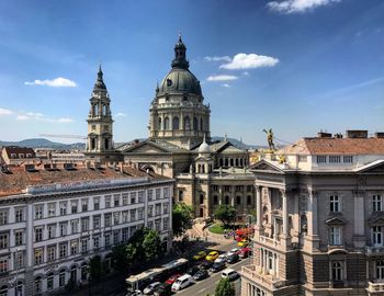 Buildings in city against sky