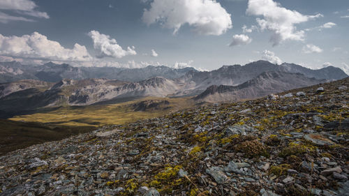 Scenic view of landscape and mountains against sky