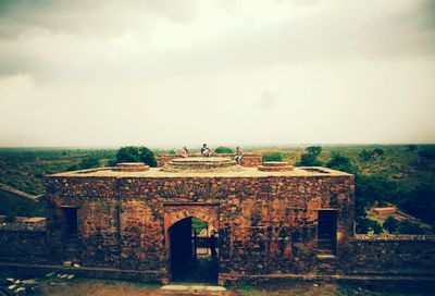 View of building against cloudy sky