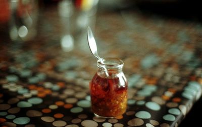 Close-up of drink in jar on table