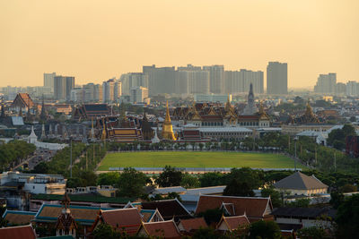 High angle view of townscape against sky during sunset