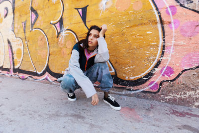 Portrait of young man standing on street