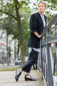 Low section of young man in park