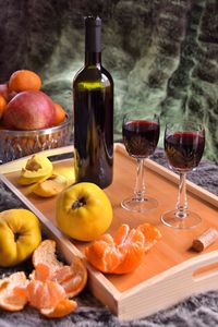 Fruits and wine in glass