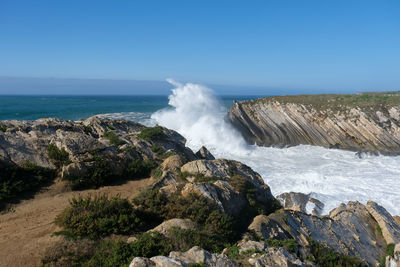 Scenic view of sea against clear sky